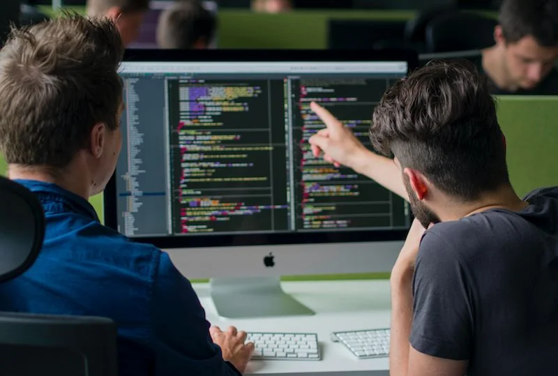 Students and developers collaborating at Exouzia Protech Academy